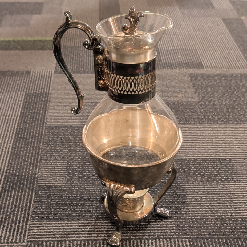 Elegant Silver and Glass Pitcher